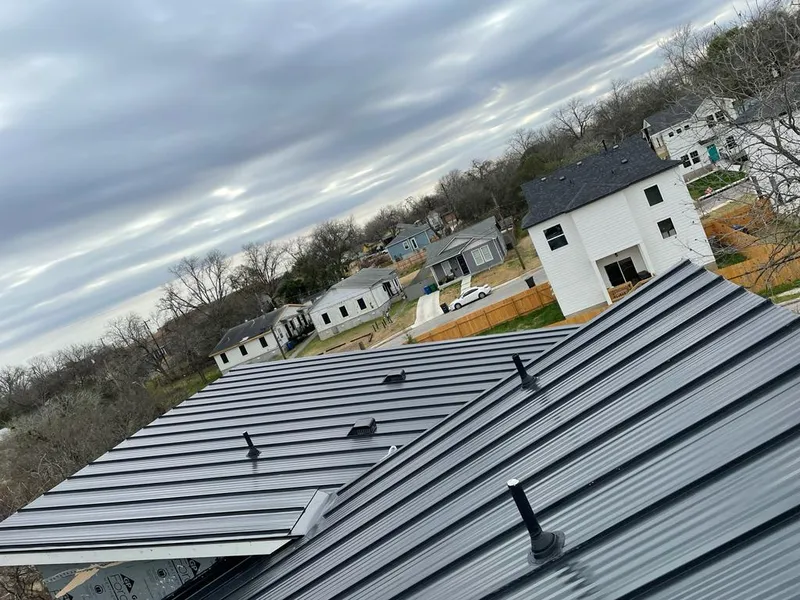 Standing seam metal roof panels with vents for Skylight Repair in Spencer